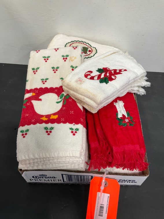 Grouping of holiday hand & fingertip towels new but dirty