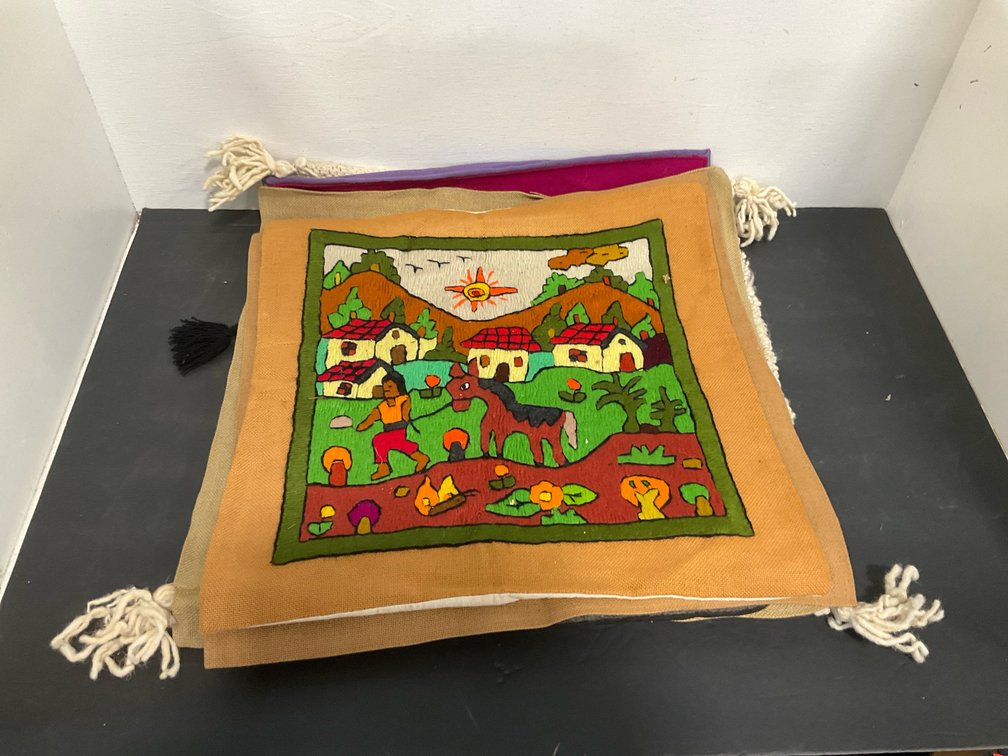 Grouping of hand embroidered & woven cushion covers and artwork
