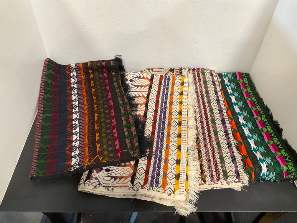 Grouping of woven geometric textiles with fringe