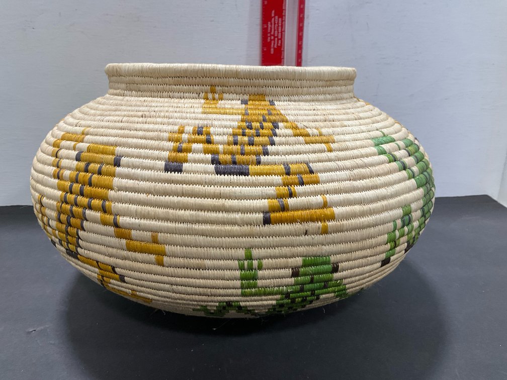 Coiled woven basket jar with cactus motifs