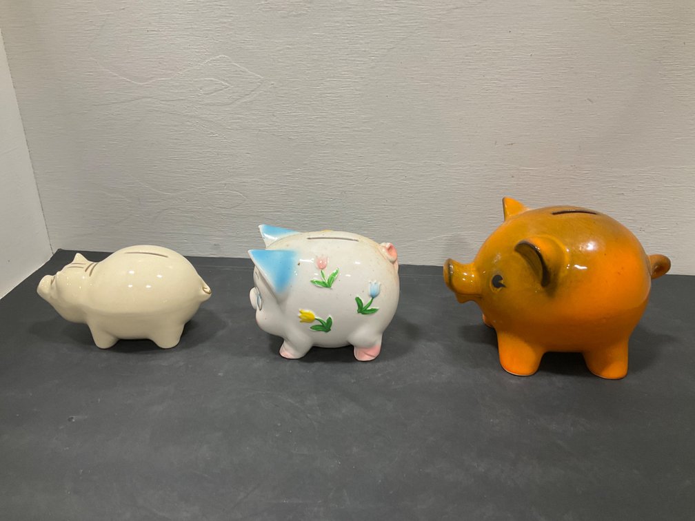 Grouping of glazed ceramic piggy banks