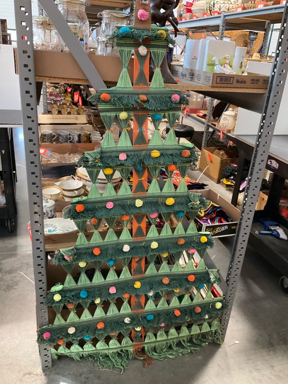 Woven yarn Christmas tree wall hanging with pom-poms