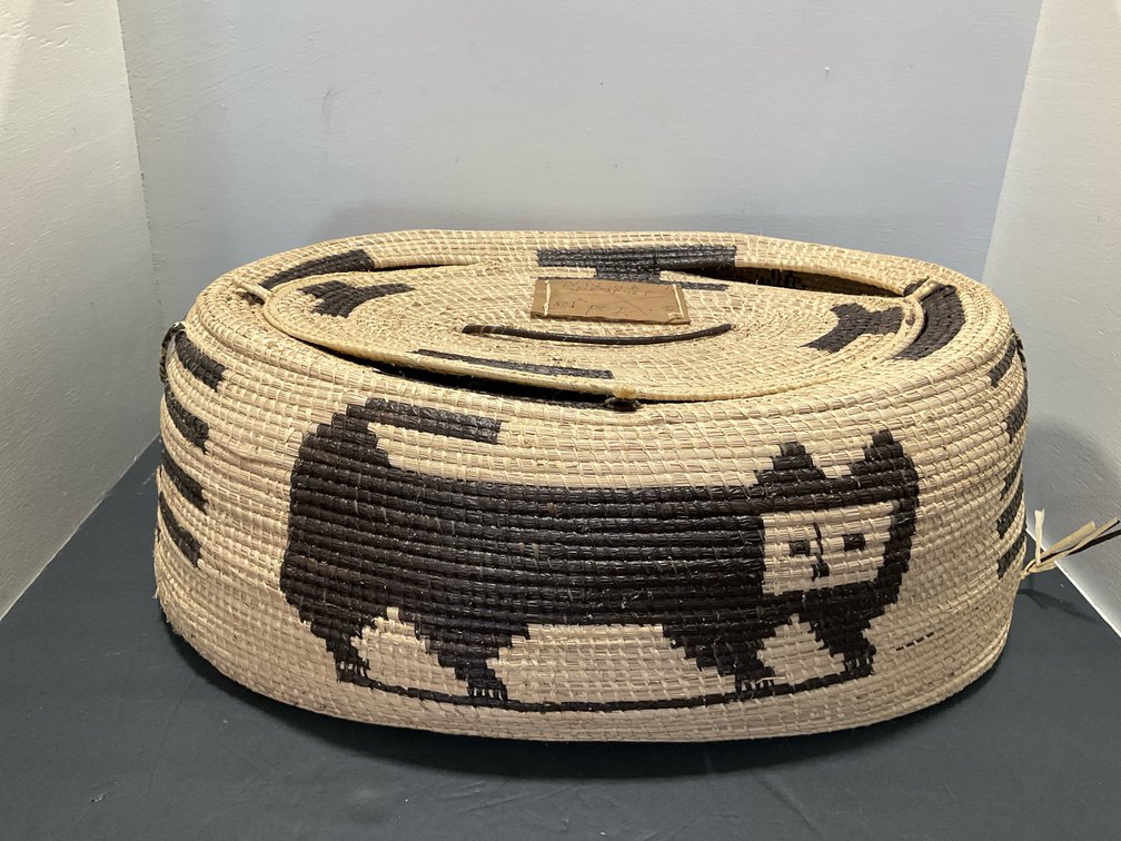 Oval coiled woven basket with lid & animal motifs