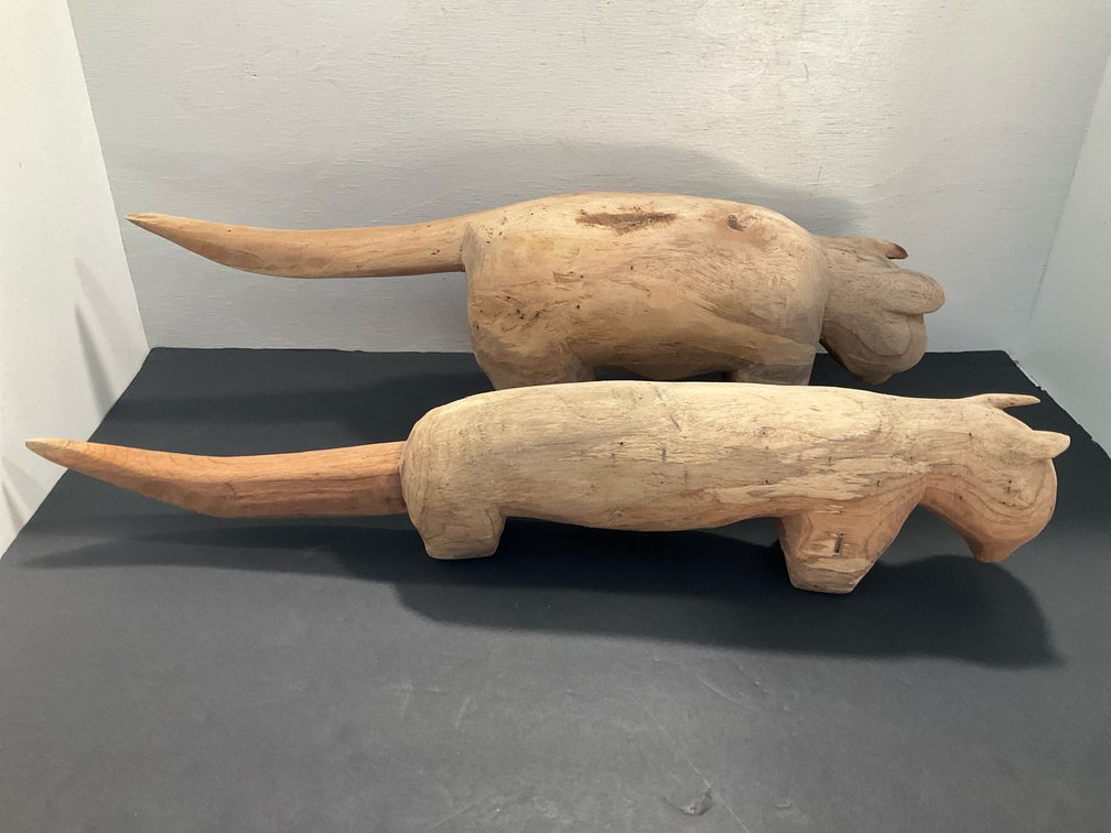 Pair of hand-carved wood animal figures