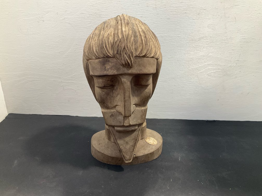 Carved wood bust of bearded man on pedestal base