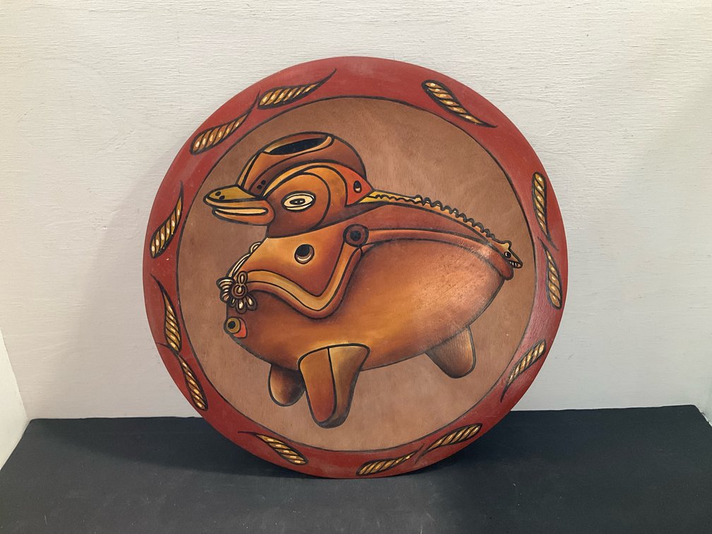 Painted wooden plate with duck effigy motif