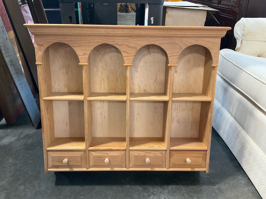 Light wood 8-cubby wall shelf with 4 drawers