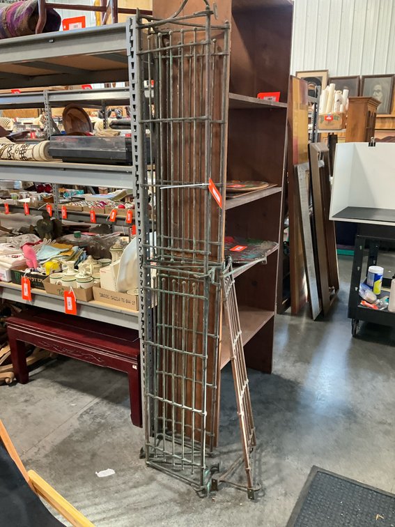 Patinated metal architectural folding gate