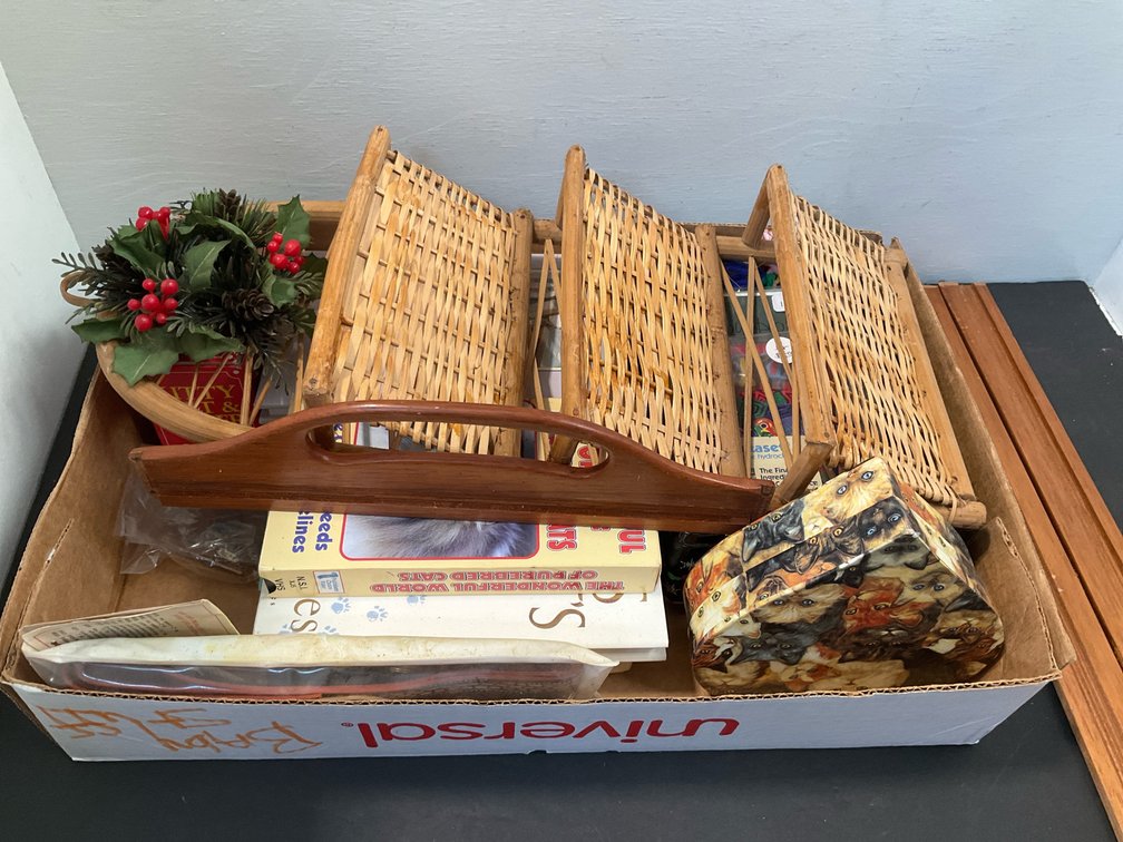Box lot of cat collectibles, wicker rack & crafts