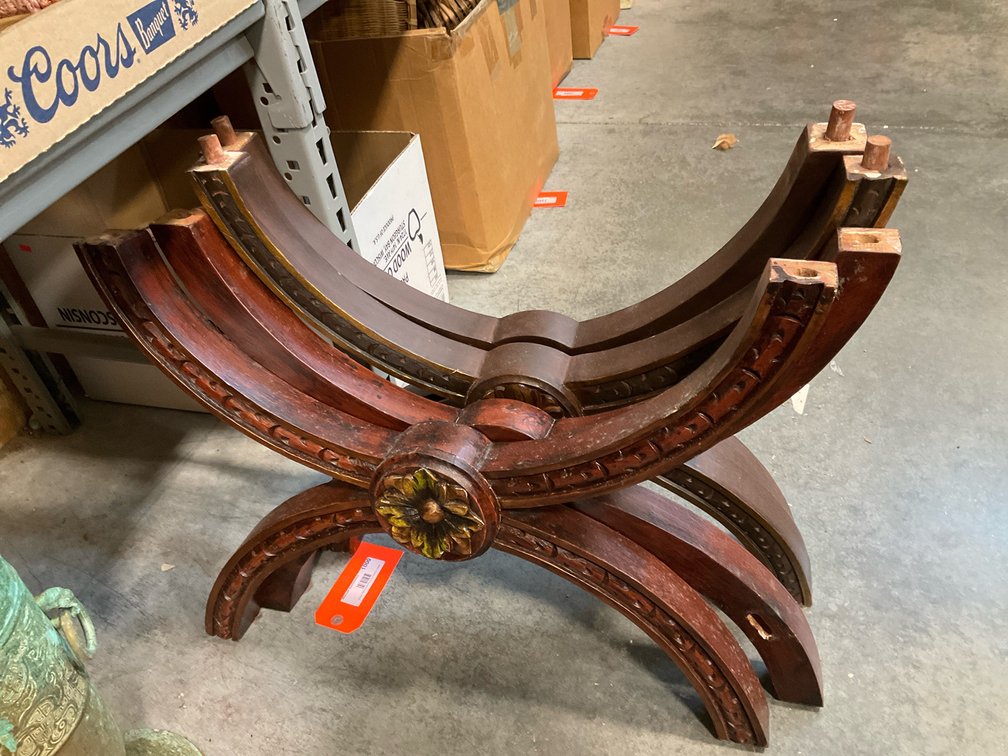 Carved wood curule X-frame base with gilt accents