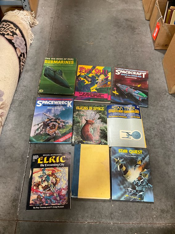 Group of science fiction & fantasy books & graphic novels