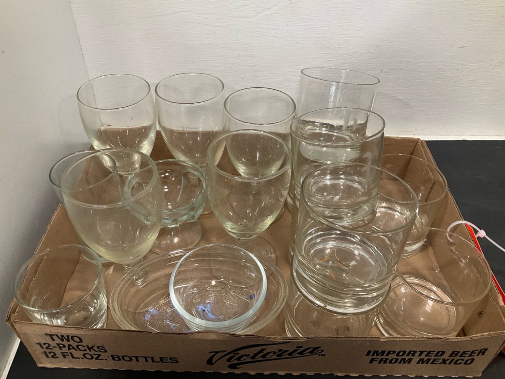 Assorted clear glassware with goblets & tumblers