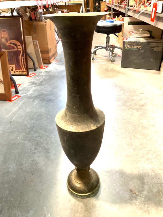 Tall brass floor vase with flared trumpet rim