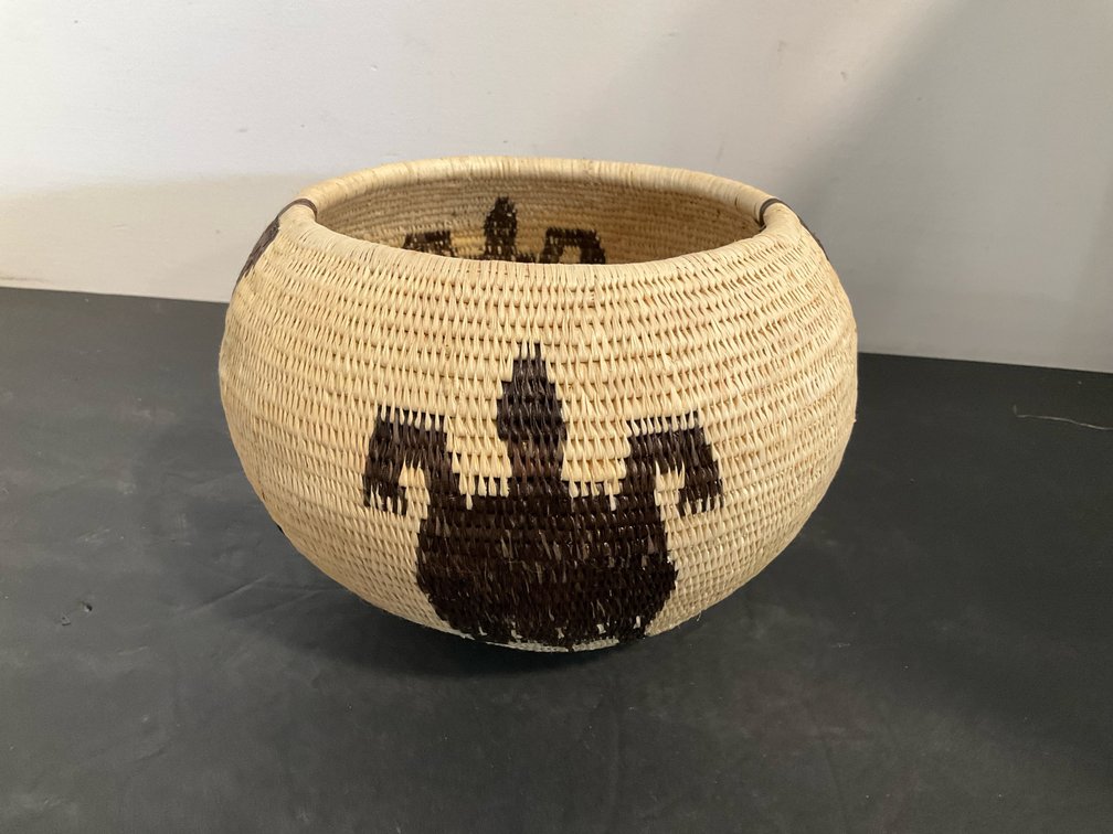 Coiled woven fiber basket with turtle motifs 5” tall