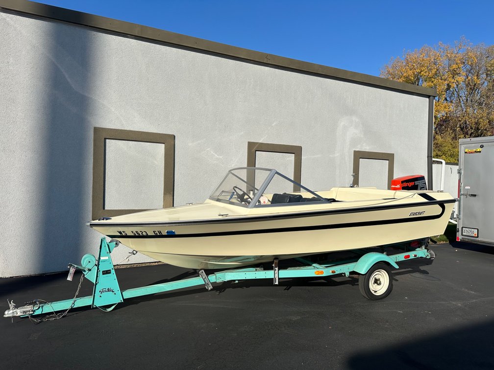Starcraft V150 Deluxe fiberglass boat with Stinger 75 HP outboard & trailer