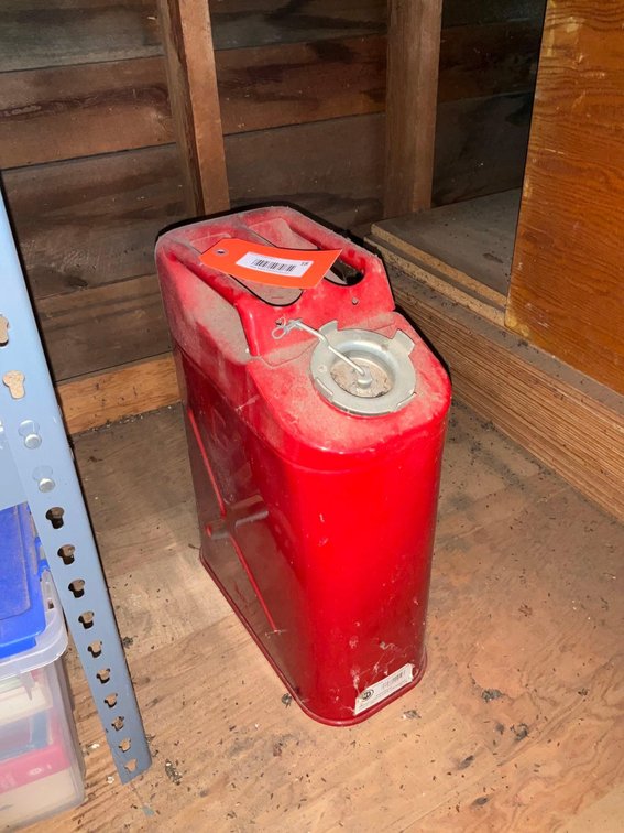 Red metal gas can-Attic