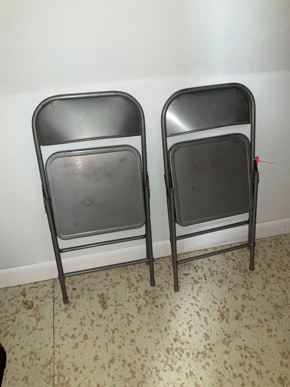 2 youth folding metal chairs-Upstairs 