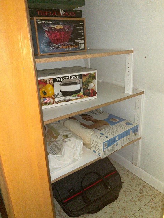 Window fan & contents of closet-Upstairs 