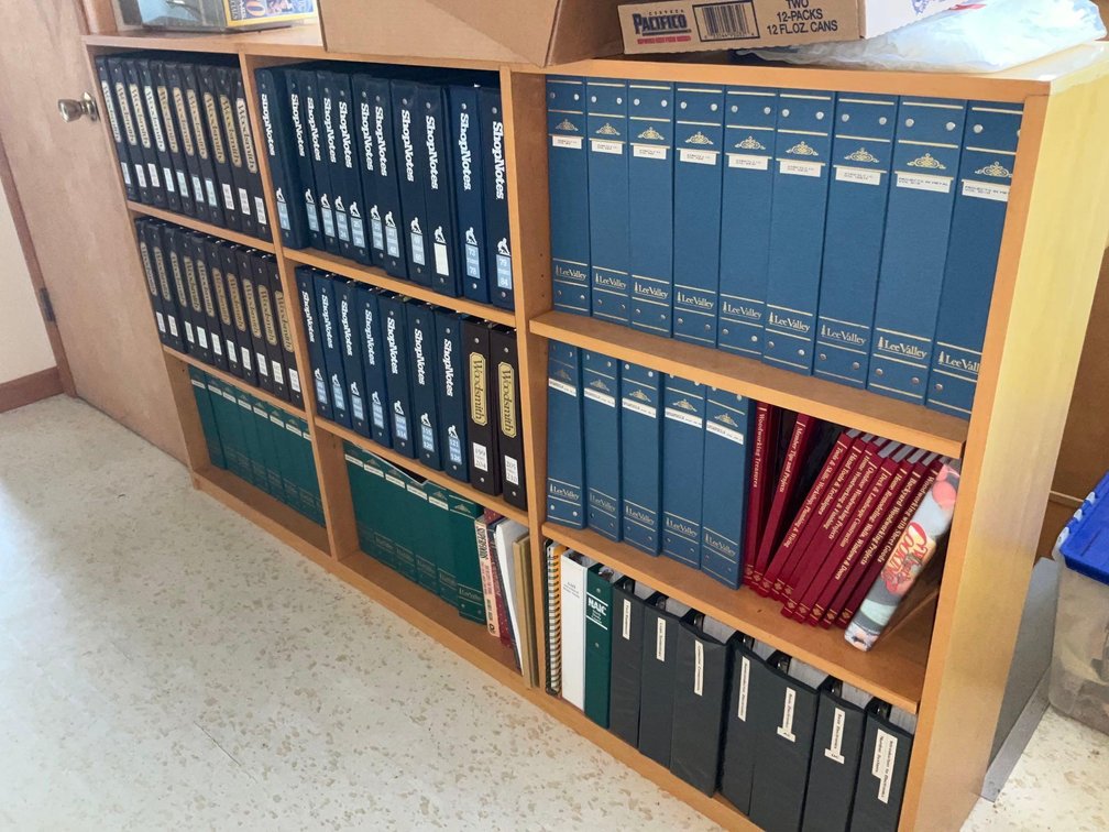 Assorted binders & books-Upstairs