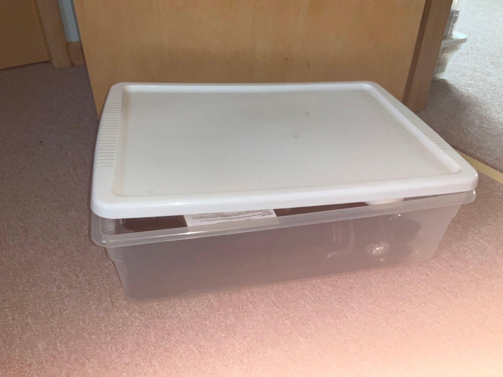 Low profile covered tote & assorted contents-Upstairs