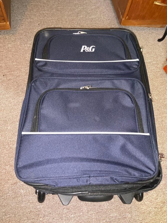 P &G suitcase-Upstairs