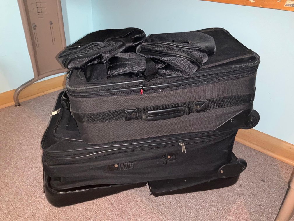 Assorted suitcases-Upstairs