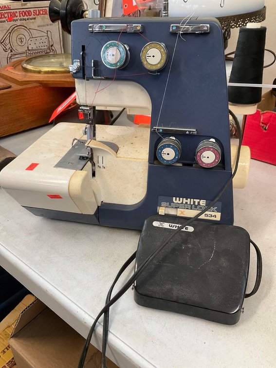 White super lock 534 sewing machine 
