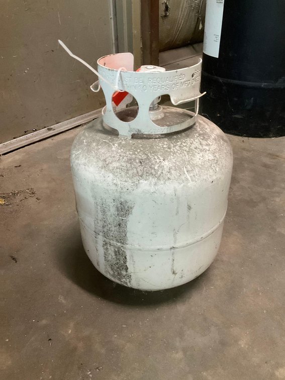 Propane tank (assume that it is empty) 