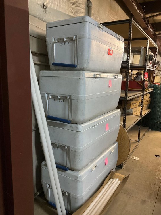 4 large coolers (assume that they leak)-Upstairs of warehouse