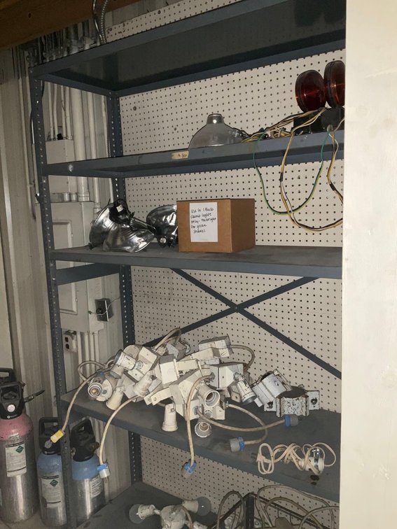 Contents of room-Extension cords, empty helium tanks & assorted