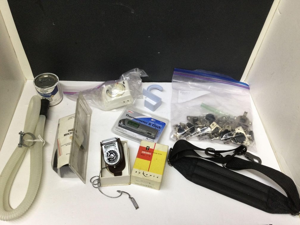 Small storage container, gun sling, timer & assorted