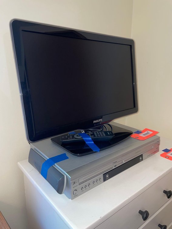 Philips 22” TV & Zenith DVD/VHS combo-Bedroom 