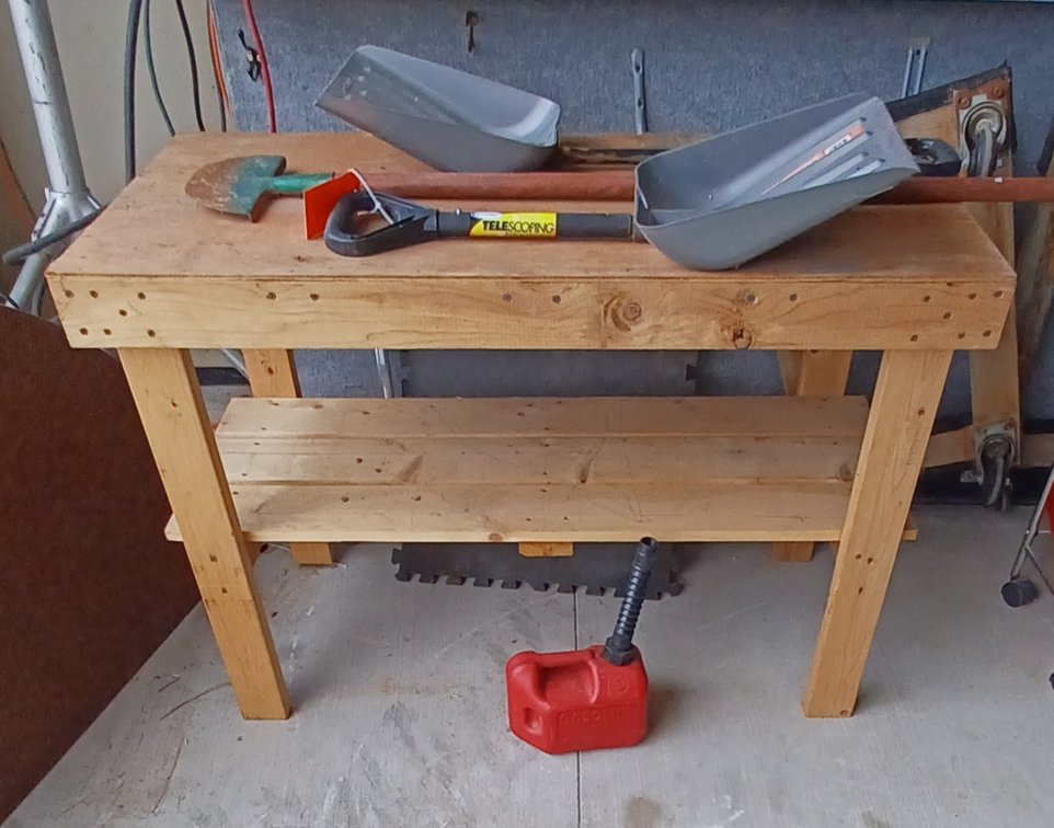 Wood shop bench 48x24x34, w/edge trimmer, telescoping shovels, gas can