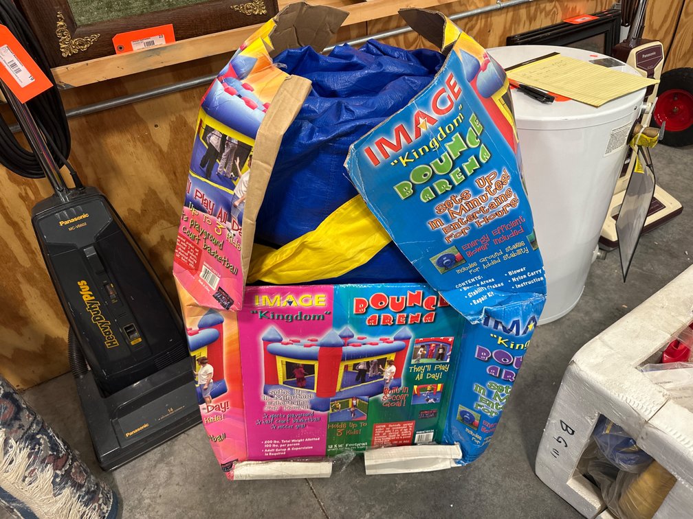 Image Kingdom bounce house with air pump fan