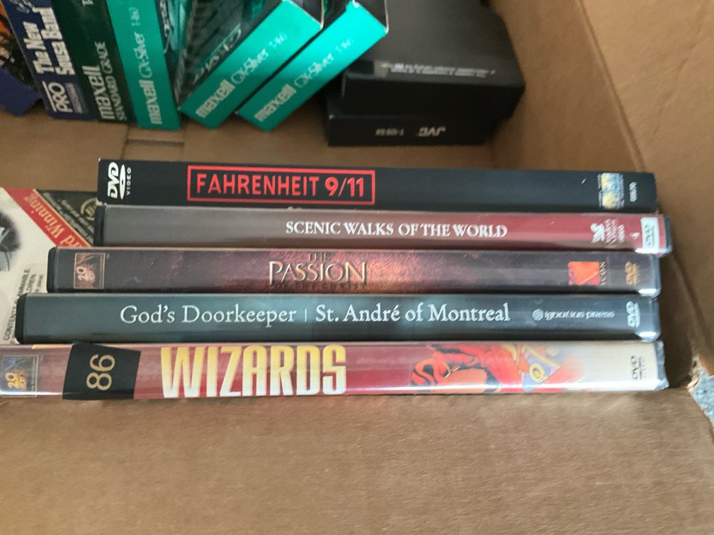 Covered tote-DVD’s, CD’s & VHS tapes-Living room 