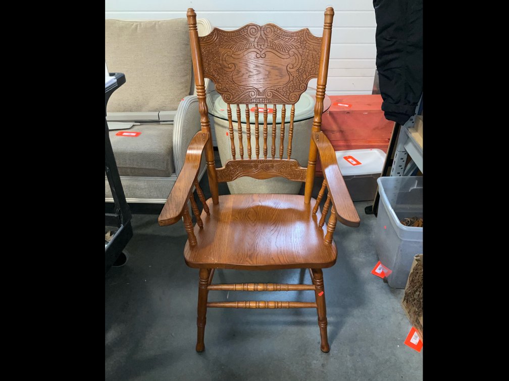 Wooden chair with arms