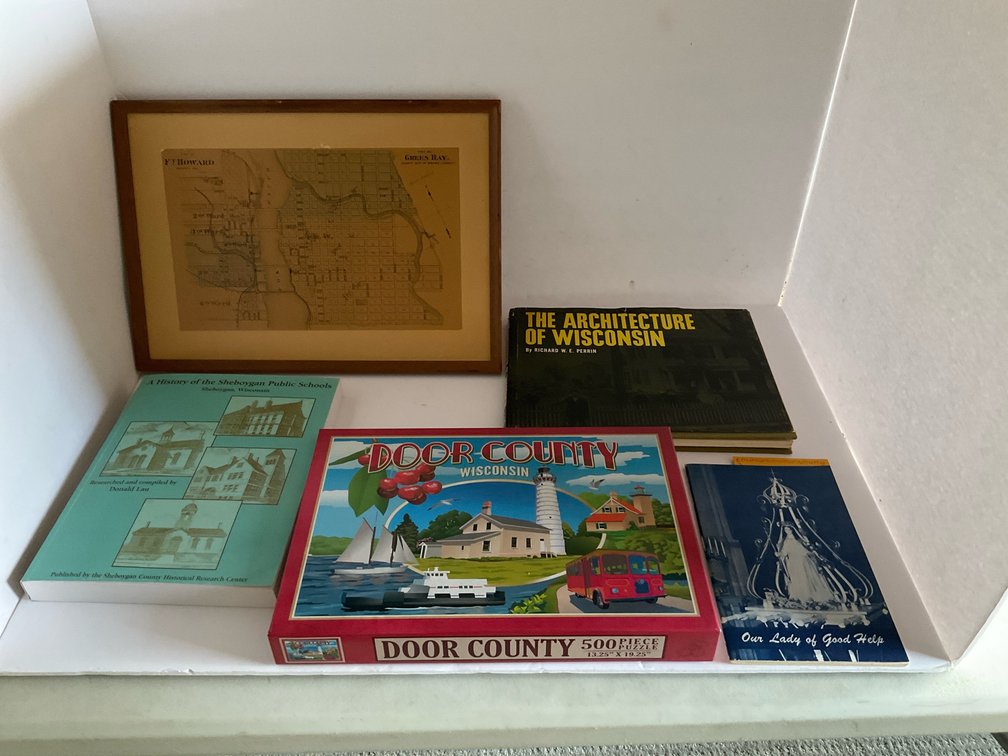 Puzzles & assorted Wisconsin books-Living room 