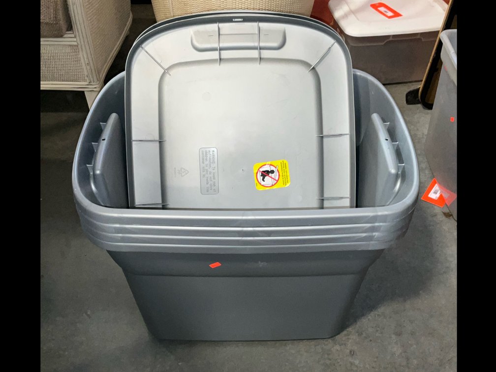 Four totes with covers