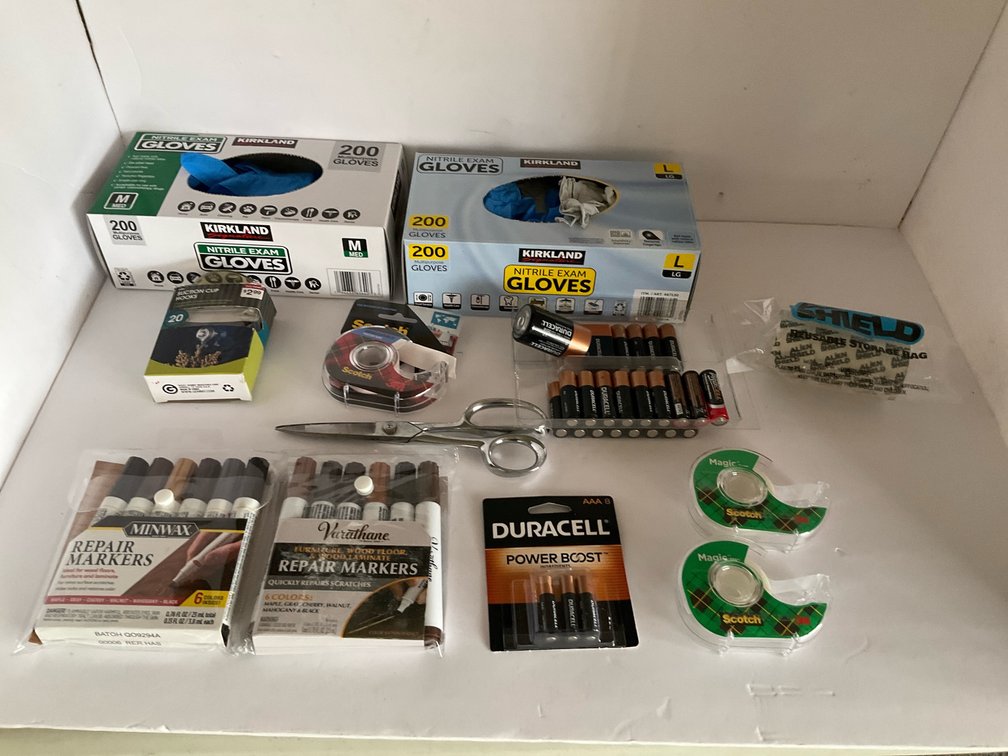 Exam gloves, batteries & assorted-Living room 