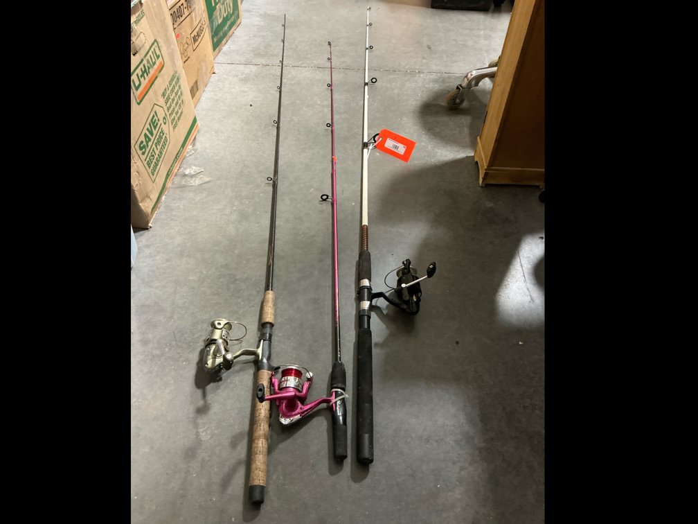 Three fishing rods and reels