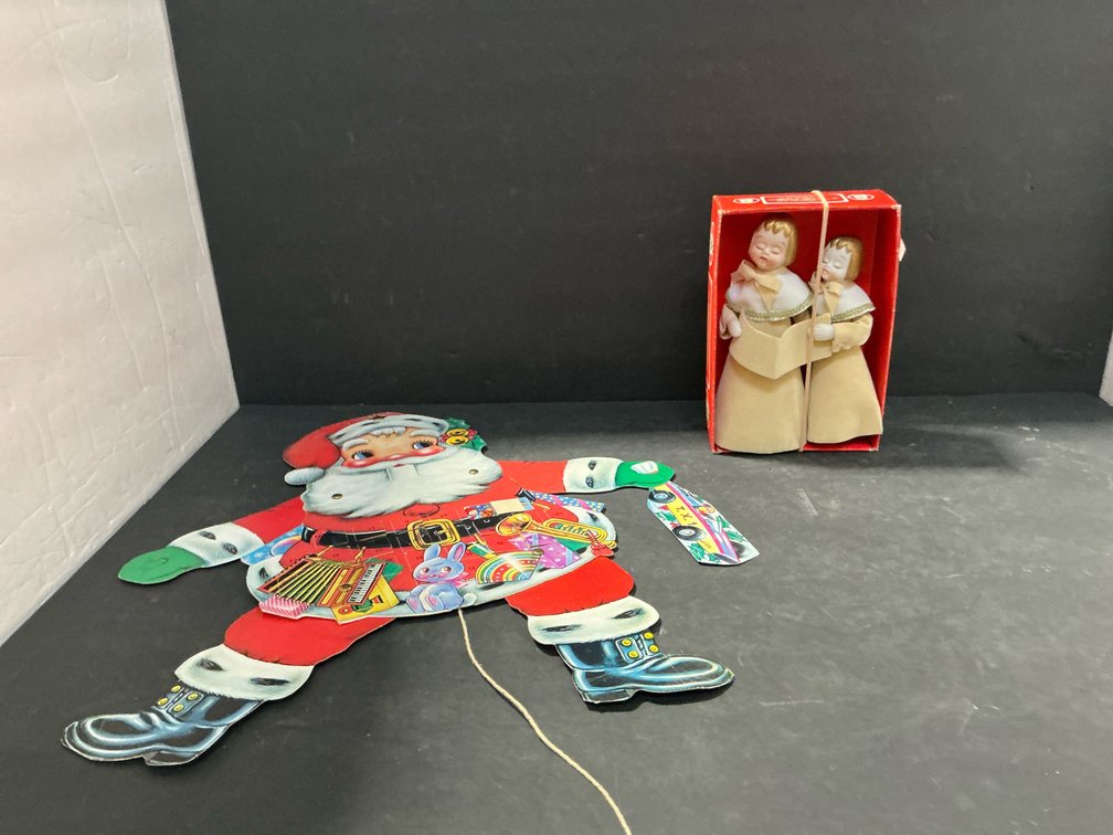 Jointed paper advent calendar, porcelain choir singer tree top
