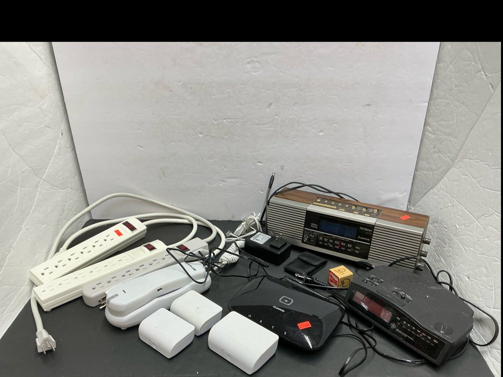Alarm clocks, power strip & assorted 