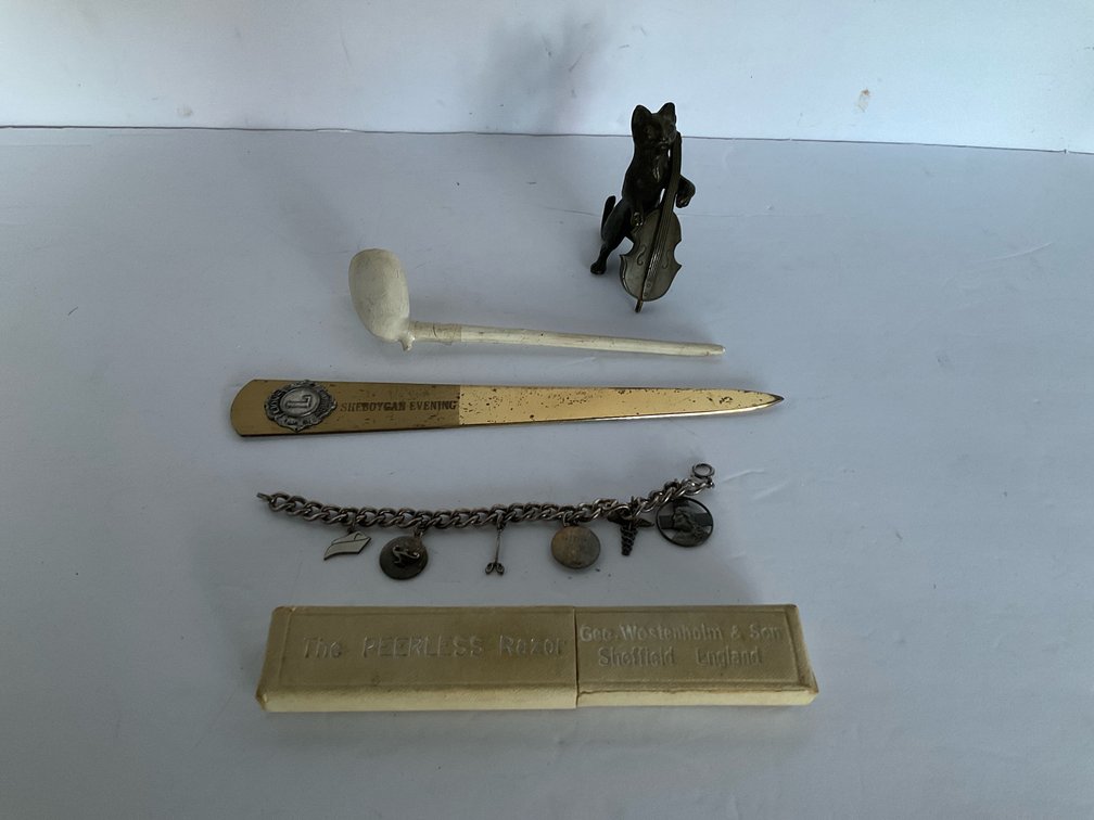 Pipe, straight razor & assorted-Living room 