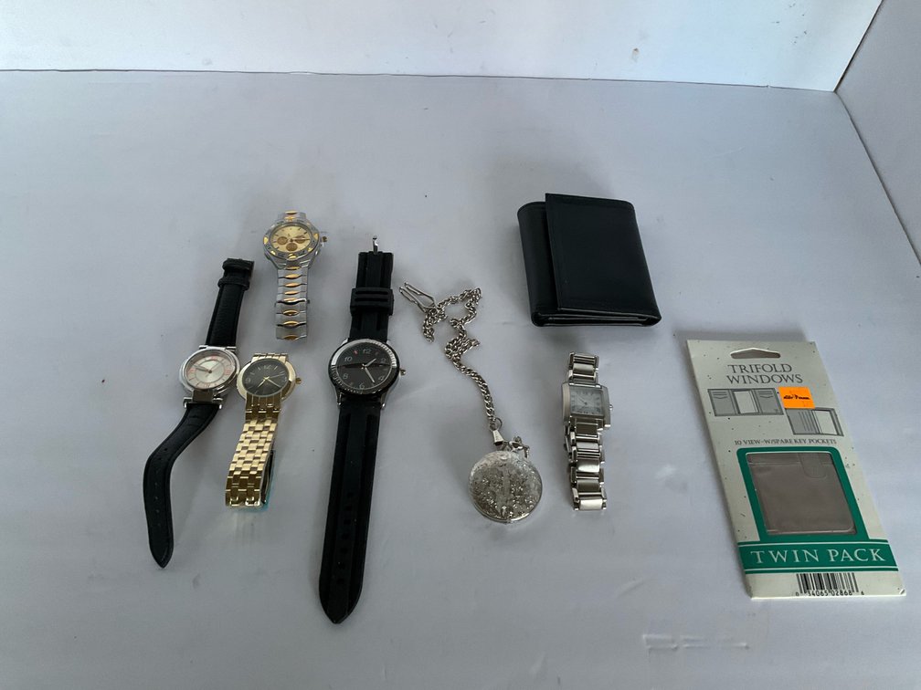 Wallet & assorted wrist watches-Living room 