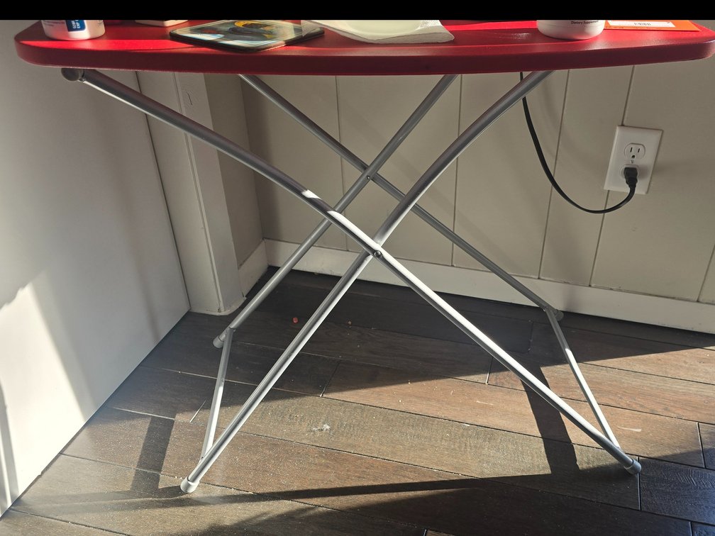 Small red folding table 26x17x25”-Bedroom 