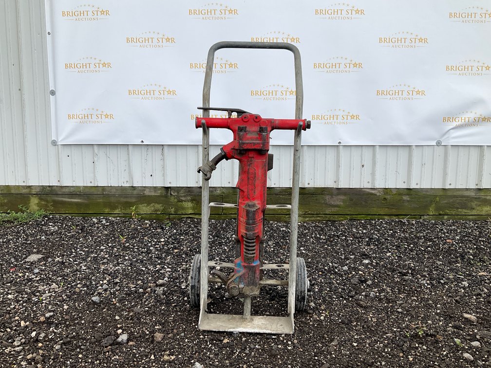 Pneumatic Jackhammer on Transport Cart with Chisel Bits