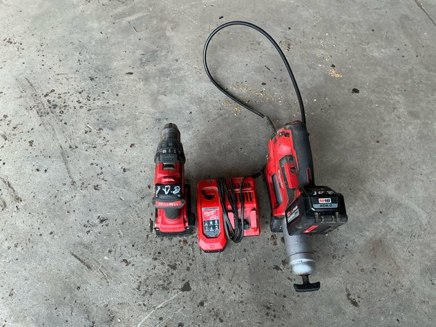 Milwaukee M18 Cordless Tool Lot: 2706-20 Hammer Drill, 2646-20 Grease Gun, 48-59-1808 Rapid Charger & Batteries