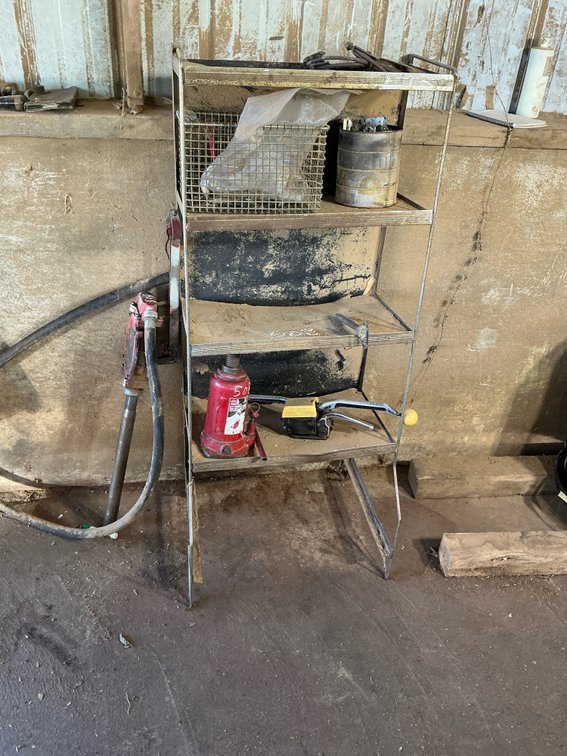 Metal Utility Shelf with Hydraulic Bottle Jack, Strapping Tool, Rotary Drum Pump, and More
