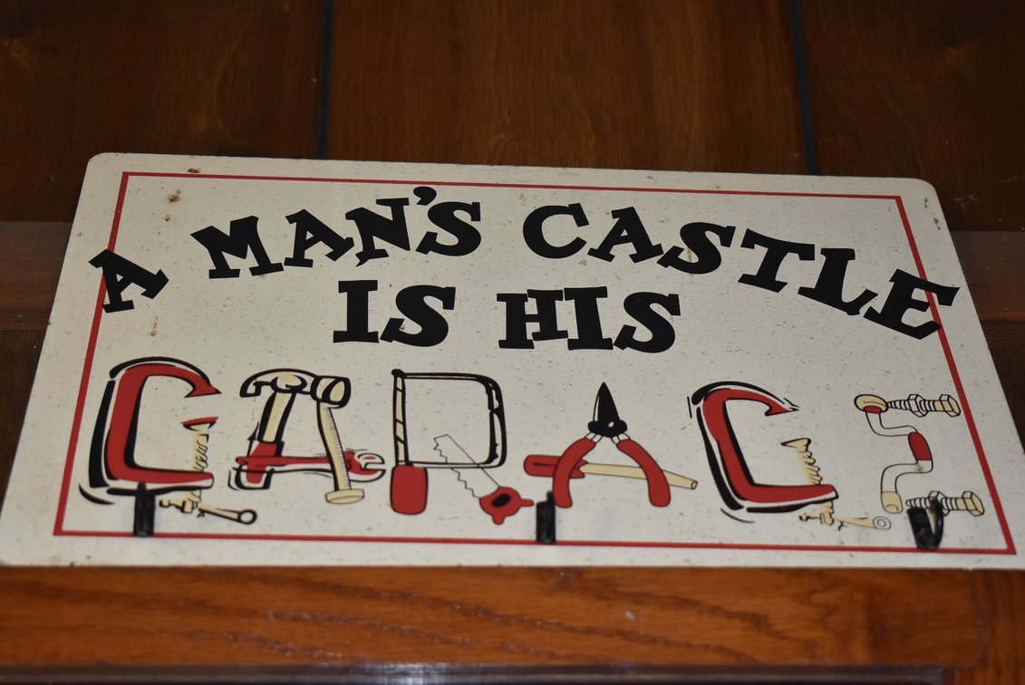“A Man’s Castle is His Garage” Sign
