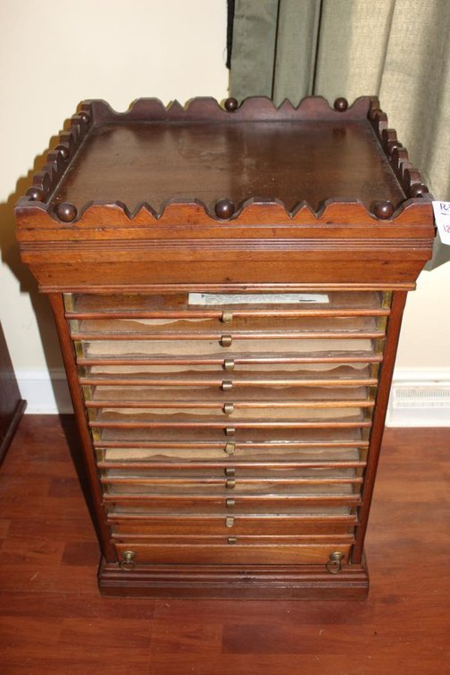 American Late 19th Century Large Spool Cabinet w/ 12 Narrow Glass Front Drawers, 1 Large Drawer in Plinth Base